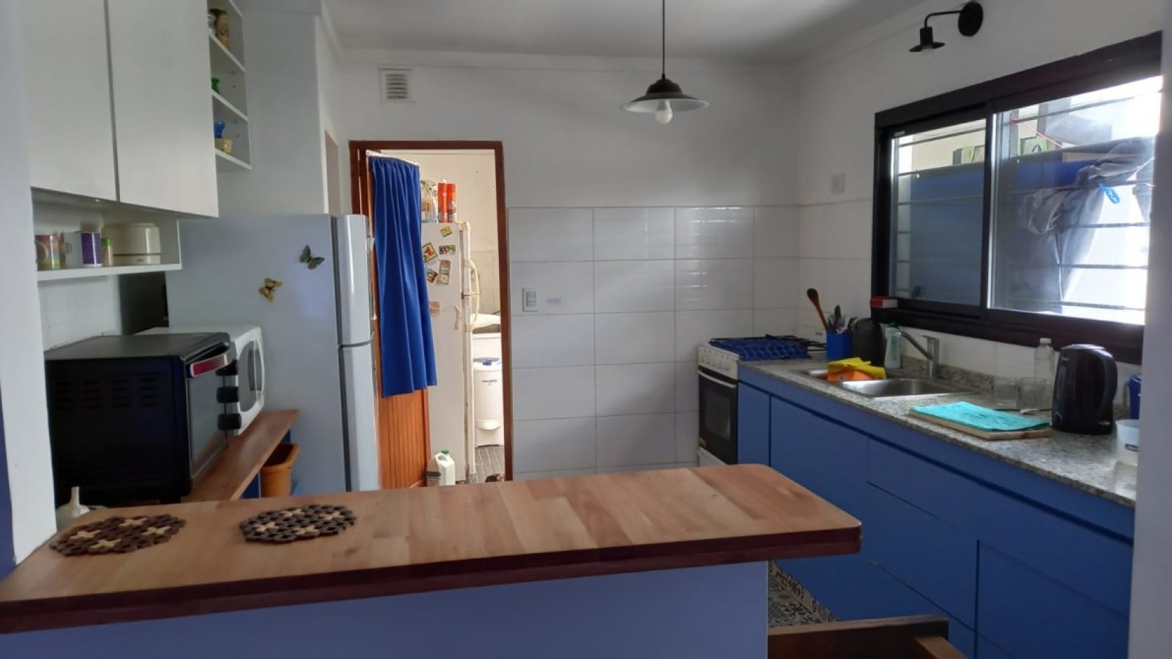 VENTA EN SANTA TERESITA CASA DE 4 AMBIENTES , EXCELENTE UBICACION, GAS NATURAL Y COCHERA