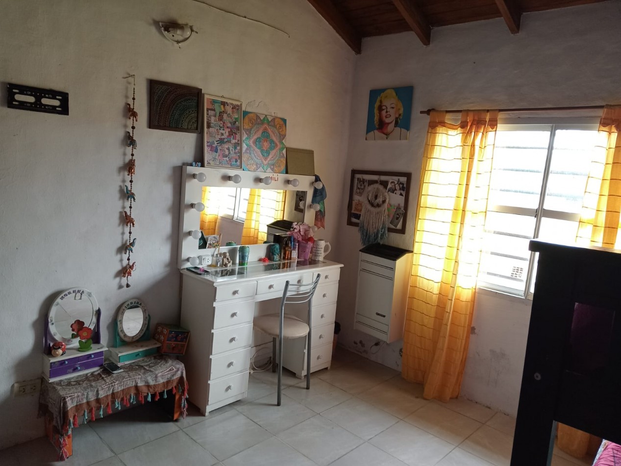 CHALET 3 AMBIENTES CON FONDO LIBRE